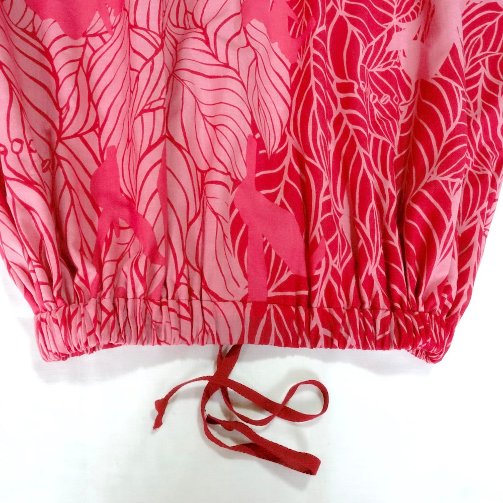 AMONG ロングスカート カンナ_愛情 生命力溢れるカンナ柄。コットン100%で上品に揺れるフレアロングスカートで都会の私を彩る。